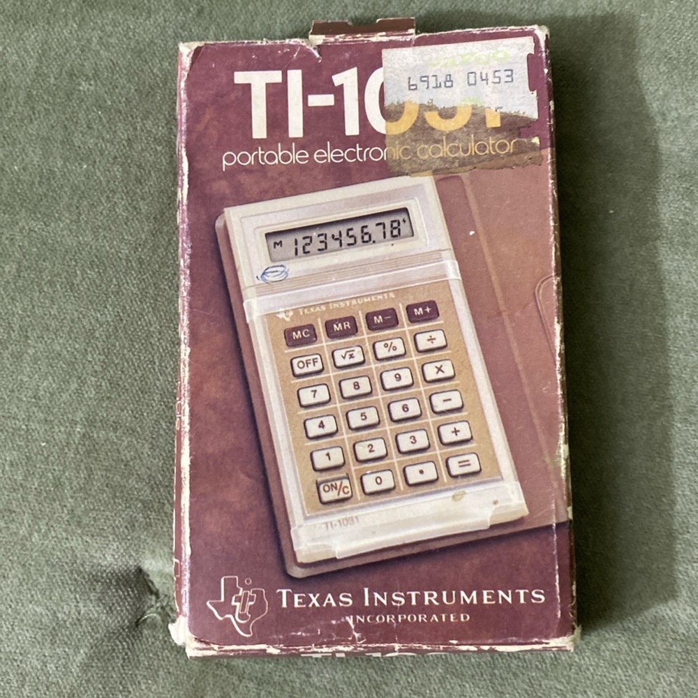 Vintage Electronic portable calculator TI-1031 1981 with box cover and manual #1
